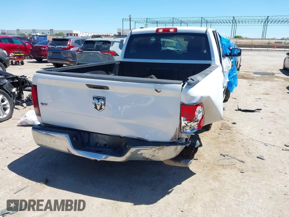 2021 Ram 1500 SLT with VIN 1C6RR6TTXMS517345, listed as a IAAI auction lot 42314123 with 107,307 mi miles and . Bid and sale history available at DreamBid. Image 4.