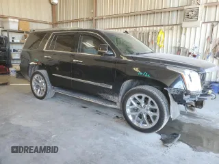 2016 Cadillac Escalade Premium Collection with VIN 1GYS4CKJ1GR477640, listed as a Copart auction lot 46214825 with 131,636 mi miles and Salvage title. Bid and sale history available at DreamBid. Image 4.