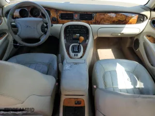 2000 Jaguar XJ with VIN SAJDA14C1YLF10459, listed as a Copart auction lot 65583394 with 113,333 mi miles and Salvage Title. Bid and sale history available at carsss.com. Image 8.