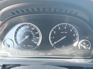 2009 BMW 7 Series 750i with VIN WBAKA83549CY35202, listed as a IAAI auction lot 41871197 with 134,736 mi miles. Bid and sale history available at carsss.com. Image 7.