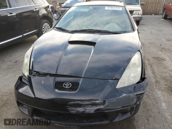 2002 Toyota Celica GT with VIN JTDDR32T720138265, listed as a Copart auction lot 87661215 with 188,822 mi miles and Salvage Title. Bid and sale history available at carsss.com. Image 5.