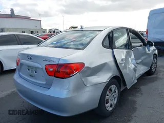 2009 Hyundai Elantra SE z VIN KMHDU46D89U711633, wystawiony jako IAAI lot #42239722 z przebiegiem 156 270 mil mil oraz . Historia ofert i sprzedaży dostępna na DreamBid. Obrazek 4.