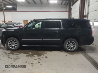 2015 GMC Yukon XL SLT with VIN 1GKS2HKC9FR175011, listed as a IAAI auction lot 41510519 with 194,136 mi miles. Bid and sale history available at carsss.com. Image 14.