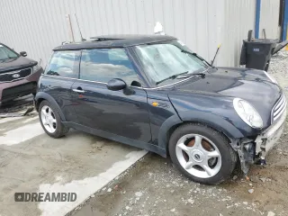 2005 MINI Hardtop with VIN WMWRC33595TJ72148, listed as a Copart auction lot 54310325 with 189,243 mi miles and Salvage title. Bid and sale history available at DreamBid. Image 4.