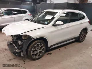 2021 BMW X1 xDrive28i with VIN WBXJG9C0XM5T76975, listed as a IAAI auction lot 41310115 with 26,869 mi miles. Bid and sale history available at carsss.com. Image 20.