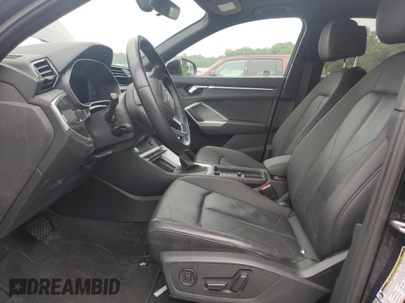 2020 Audi Q3 Premium with VIN WA1AECF35L1088335, listed as a Copart auction lot 65602815 with 53,926 mi miles and Salvage title. Bid and sale history available at DreamBid. Image 7.
