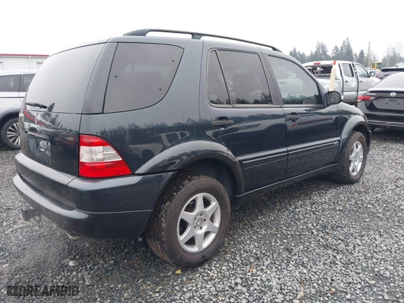 2002 Mercedes-Benz M-Class with VIN 4JGAB54E72A296354, listed as a IAAI auction lot 41277897 with 101,842 mi miles. Bid and sale history available at carsss.com. Image 4.