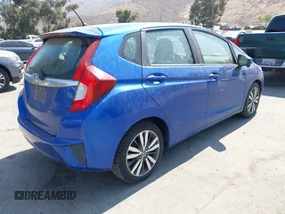 2015 Honda Fit EX-L z VIN 3HGGK5H85FM730218, wystawiony jako IAAI lot #42818190 z przebiegiem 153 822 mil mil oraz . Historia ofert i sprzedaży dostępna na DreamBid. Obrazek 4.