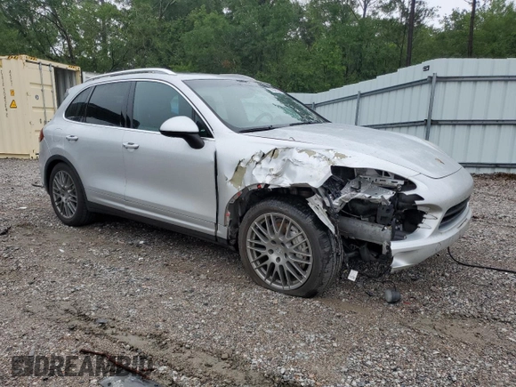 2014 Porsche Cayenne S with VIN WP1AB2A25ELA57213, listed as a Copart auction lot 57843255 with 165,501 mi miles and Salvage title. Bid and sale history available at DreamBid. Image 4.