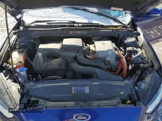 2013 Ford Fusion SE Hybrid z VIN 3FA6P0LU3DR207191, wystawiony jako Copart lot #47504025 z przebiegiem Nie podano mil oraz Nie do naprawy • Non repairable. Historia ofert i sprzedaży dostępna na DreamBid. Obrazek 12.