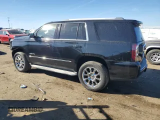 2015 GMC Yukon Denali with VIN 1GKS1CKJ9FR134446, listed as a Copart auction lot 77460274 with 158,903 mi miles and Clean Title. Bid and sale history available at carsss.com. Image 2.