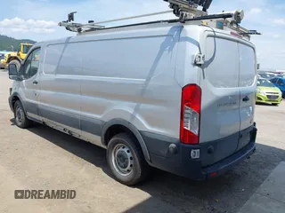 2020 Ford Transit Cargo z VIN 1FTYE1Y80LKB53684, wystawiony jako IAAI lot #42556377 z przebiegiem 102 801 mil mil oraz . Historia ofert i sprzedaży dostępna na DreamBid. Obrazek 3.