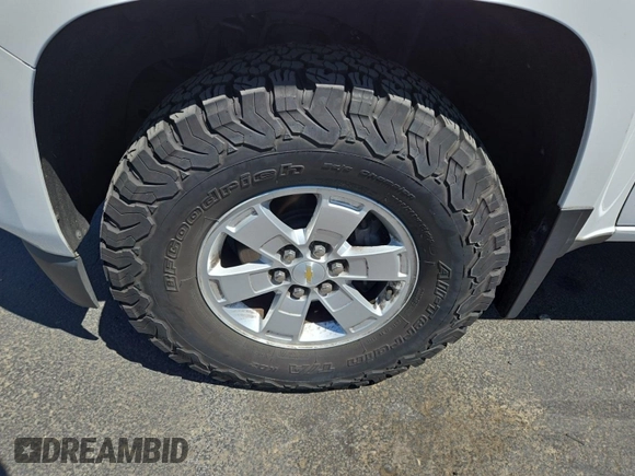 2017 Chevrolet Colorado 2WD WT z VIN 1GCHSBEN9H1265759, wystawiony jako IAAI lot #42727938 z przebiegiem 93 775 mil mil oraz . Historia ofert i sprzedaży dostępna na DreamBid. Obrazek 1.