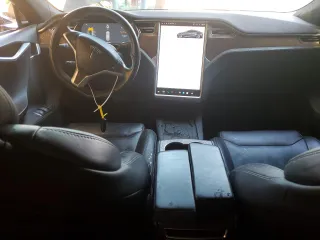 2017 Tesla Model S 60 z VIN 5YJSA1E18HF192715, wystawiony jako Copart lot #56851225 z przebiegiem 103 231 mil mil oraz Szkoda całkowita • Salvage title. Historia ofert i sprzedaży dostępna na DreamBid. Obrazek 8.