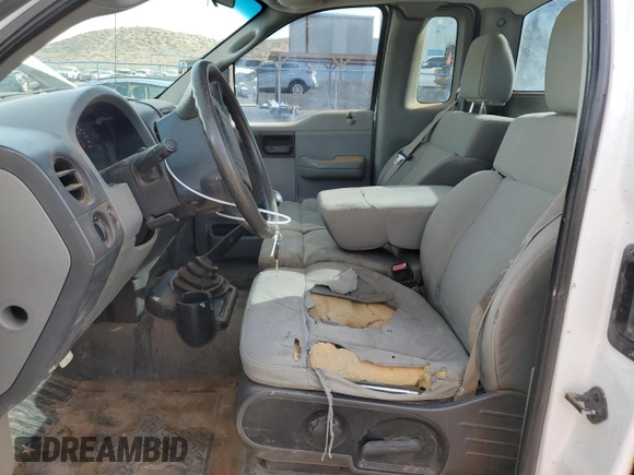 2007 Ford F-150 XL with VIN 1FTRF12287KC42057, listed as a Copart auction lot 85299854 with 2,060,155 mi miles and Salvage title. Bid and sale history available at DreamBid. Image 7.