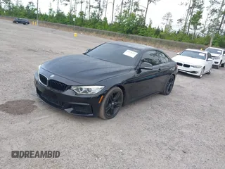 2015 BMW 4 Series 428i with VIN WBA3N3C55FK232319, listed as a IAAI auction lot 42136421 with 140,300 mi miles and . Bid and sale history available at DreamBid. Image 2.