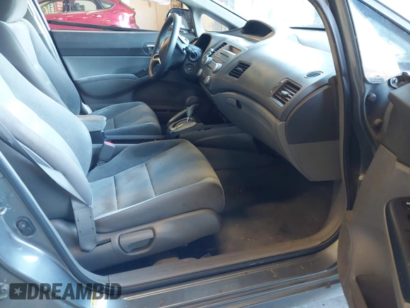 2009 Honda Civic LX z VIN 2HGFA16599H314871, wystawiony jako IAAI lot #41403199 z przebiegiem 144 963 mil mil oraz . Historia ofert i sprzedaży dostępna na DreamBid. Obrazek 5.