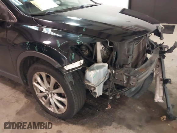 2015 Mazda CX-9 Grand Touring with VIN JM3TB3DV3F0460493, listed as a IAAI auction lot 41053565 with 213,124 mi miles. Bid and sale history available at carsss.com. Image 6.