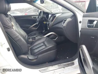 2014 Hyundai Veloster with VIN KMHTC6ADXEU213073, listed as a IAAI auction lot 41551346 with 130,549 mi miles. Bid and sale history available at carsss.com. Image 5.