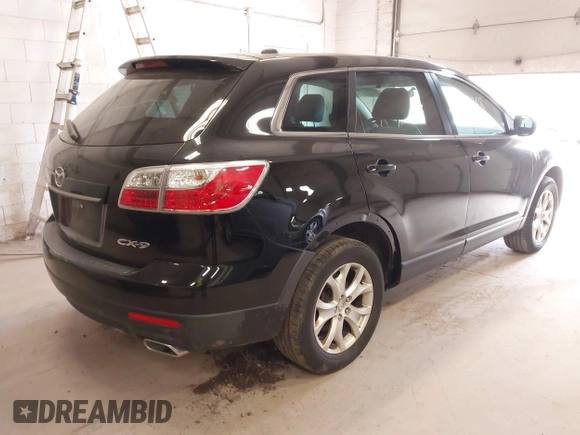2011 Mazda CX-9 Touring with VIN JM3TB2CV1B0300621, listed as a IAAI auction lot 42002068 with 185,162 mi miles and . Bid and sale history available at carsss.com. Image 4.