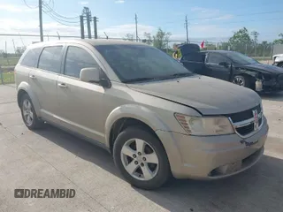 2009 Dodge Journey SXT with VIN 3D4GG57VX9T196136, listed as a IAAI auction lot 42034751 with 129,537 mi miles. Bid and sale history available at carsss.com. Image 1.