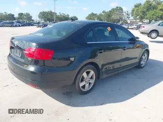2013 Volkswagen Jetta TDI w/Premium with VIN 3VWLL7AJ6DM438641, listed as a IAAI auction lot 42724848 with Not provided miles and . Bid and sale history available at DreamBid. Image 4.