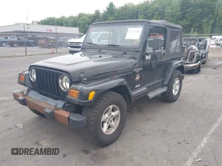 2001 Jeep Wrangler Sahara with VIN 1J4FA59S41P376079, listed as a IAAI auction lot 42739280 with 255,999 mi miles and . Bid and sale history available at DreamBid. Image 2.