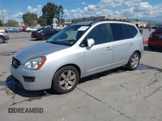 2008 Kia Rondo LX with VIN KNAFG526187170582, listed as a IAAI auction lot 41964300 with 259,741 mi miles. Bid and sale history available at carsss.com. Image 2.