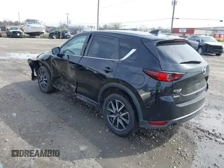 2018 Mazda CX-5 Touring with VIN JM3KFBCMXJ0438177, listed as a IAAI auction lot 42152275 with 65,434 mi miles and . Bid and sale history available at carsss.com. Image 3.