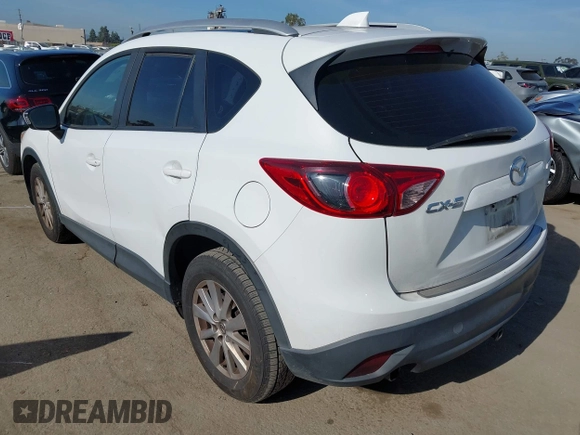 2013 Mazda CX-5 Sport with VIN JM3KE2BE4D0153251, listed as a IAAI auction lot 42297235 with 177,019 mi miles and . Bid and sale history available at DreamBid. Image 3.