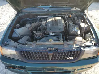 1999 Mitsubishi Montero LS z VIN JA4LS31H5XP033598, wystawiony jako Copart lot #85609464 z przebiegiem 185 686 mil mil oraz Szkoda całkowita • Salvage title. Historia ofert i sprzedaży dostępna na DreamBid. Obrazek 12.