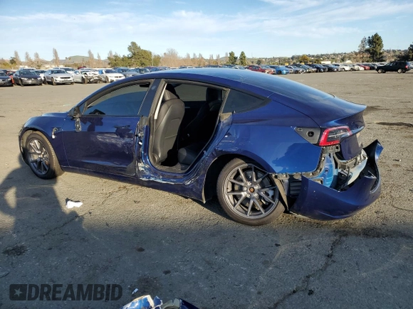 2022 Tesla Model 3 Long Range with VIN 5YJ3E1EB6NF255730, listed as a Copart auction lot 46354235 with 58,470 mi miles and Salvage Title. Bid and sale history available at DreamBid. Image 2.