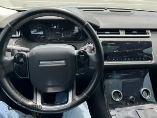 2019 Land Rover Range Rover Velar S z VIN SALYB2EV9KA793415, wystawiony jako Copart lot #65096785 z przebiegiem 101 667 mil mil oraz Czysty tytuł • Clean title. Historia ofert i sprzedaży dostępna na DreamBid. Obrazek 7.