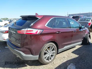 2019 Ford Edge Titanium z VIN 2FMPK3K94KBB41673, wystawiony jako IAAI lot #41762692 z przebiegiem 82 812 mil mil oraz . Historia ofert i sprzedaży dostępna na DreamBid. Obrazek 4.