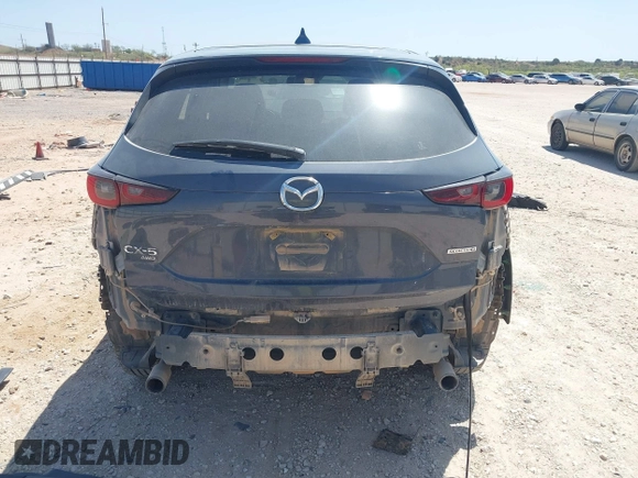 2023 Mazda CX-5 S Carbon Edition z VIN JM3KFBCM7P0164462, wystawiony jako IAAI lot #41919579 z przebiegiem 49 585 mil mil oraz . Historia ofert i sprzedaży dostępna na DreamBid. Obrazek 17.