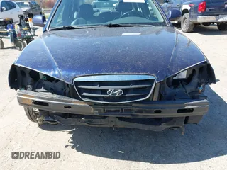 2003 Hyundai Elantra GLS z VIN KMHDN45D93U648323, wystawiony jako IAAI lot #42023382 z przebiegiem 213 540 mil mil oraz . Historia ofert i sprzedaży dostępna na DreamBid. Obrazek 6.