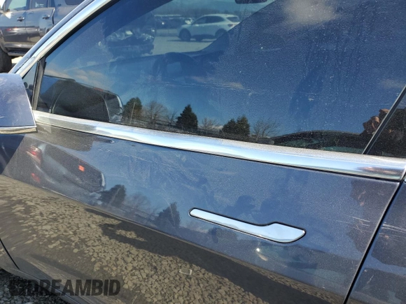 2018 Tesla Model 3 Long Range Battery with VIN 5YJ3E1EBXJF103797, listed as a Copart auction lot 47920715 with Not Provided miles and Salvage Title. Bid and sale history available at DreamBid. Image 7.