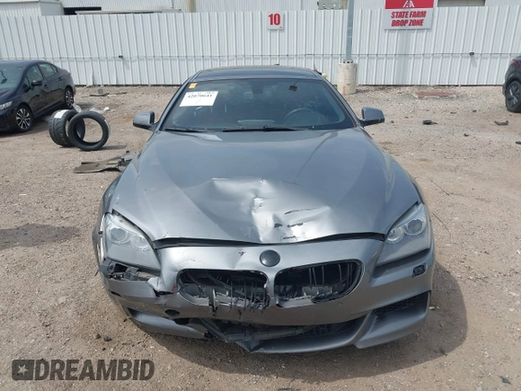 2014 BMW 6 Series 650i z VIN WBA6B2C55ED128934, wystawiony jako IAAI lot #42070641 z przebiegiem 102 597 mil mil oraz . Historia ofert i sprzedaży dostępna na DreamBid. Obrazek 12.