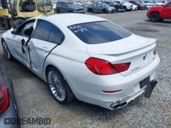 2015 BMW 6 Series 650i xDrive with VIN WBA6B4C53FD899938, listed as a IAAI auction lot 41761114 with 93,015 mi miles and . Bid and sale history available at carsss.com. Image 3.
