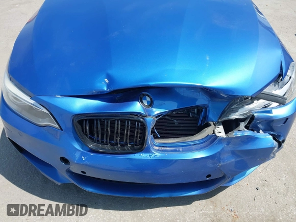 2014 BMW 2 Series M235i with VIN WBA1J7C52EVW84588, listed as a IAAI auction lot 42490194 with 103,998 mi miles and . Bid and sale history available at DreamBid. Image 18.