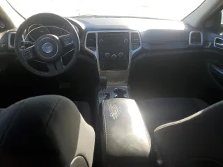 2013 Jeep Grand Cherokee Laredo with VIN 1C4RJEAG0DC636922, listed as a Copart auction lot 48796115 with 151,295 mi miles and Salvage Title. Bid and sale history available at carsss.com. Image 8.