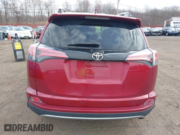 2018 Toyota RAV4 XLE with VIN 2T3RFREV4JW798868, listed as a IAAI auction lot 41751618 with 76,003 mi miles. Bid and sale history available at carsss.com. Image 16.