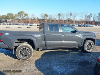 2024 Toyota Tacoma 4WD SR5 with VIN 3TMLB5JN8RM022627, listed as a IAAI auction lot 41245795 with 6,752 mi miles. Bid and sale history available at carsss.com. Image 13.