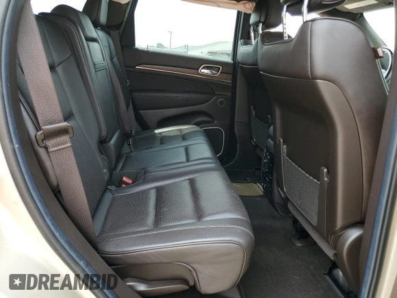 2014 Jeep Grand Cherokee Summit с VIN 1C4RJFJGXEC436797, выставлен на аукционе Copart как лот 60248595 с пробегом 156 395 миль миль и Списание • Salvage title. История ставок и продаж доступна на DreamBid. Изображение 11.