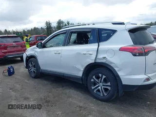 2018 Toyota RAV4 LE with VIN JTMBFREV5JJ738405, listed as a IAAI auction lot 41956145 with 100,593 mi miles and . Bid and sale history available at DreamBid. Image 12.