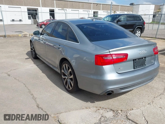 2013 Audi A6 3.0T Prestige with VIN WAUHGAFC4DN126258, listed as a IAAI auction lot 41512291 with 123,298 mi miles. Bid and sale history available at carsss.com. Image 3.