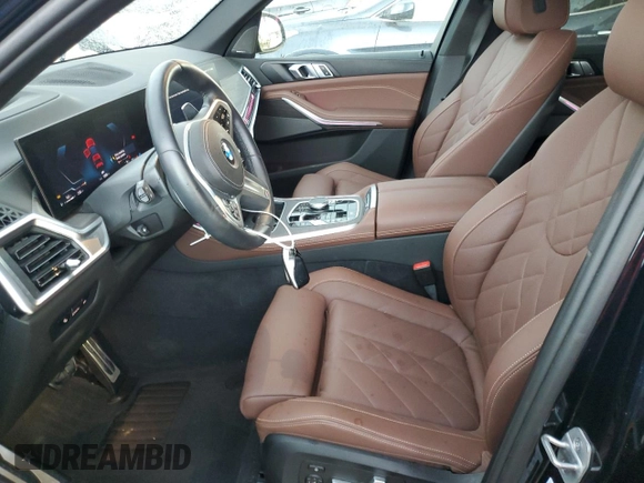2024 BMW X5 sDrive40i with VIN 5UX13EU04R9T91552, listed as a Copart auction lot 55486545 with 12,995 mi miles and Salvage title. Bid and sale history available at DreamBid. Image 7.