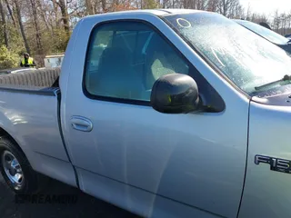 2002 Ford F-150 XL with VIN 1FTRF17222NC00760, listed as a IAAI auction lot 41653940 with 314,637 mi miles. Bid and sale history available at carsss.com. Image 13.