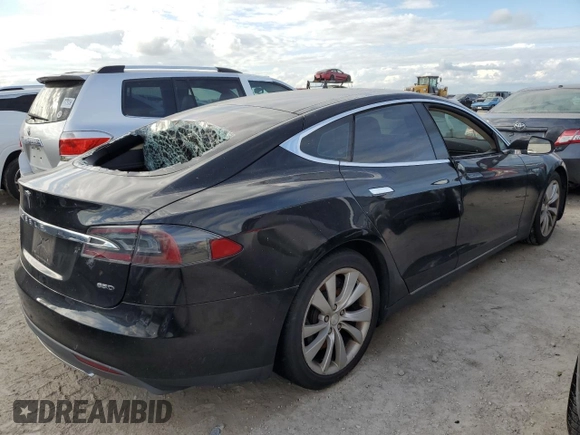 2016 Tesla Model S 90D с VIN 5YJSA1E27GF125739, выставлен на аукционе Copart как лот 75074624 с пробегом Не указан миль и Списание • Salvage title. История ставок и продаж доступна на DreamBid. Изображение 3.