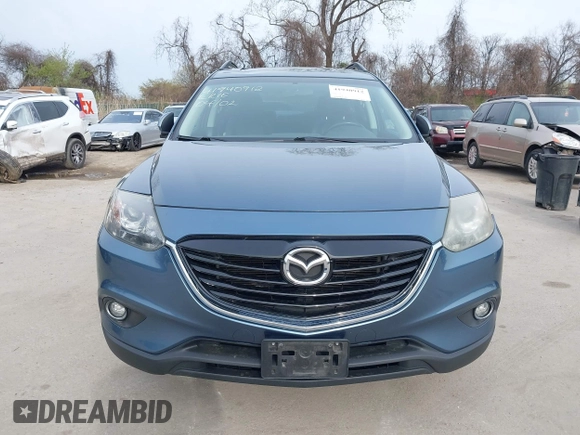 2015 Mazda CX-9 Touring with VIN JM3TB3CVXF0460959, listed as a IAAI auction lot 41940912 with 166,674 mi miles and . Bid and sale history available at DreamBid. Image 12.